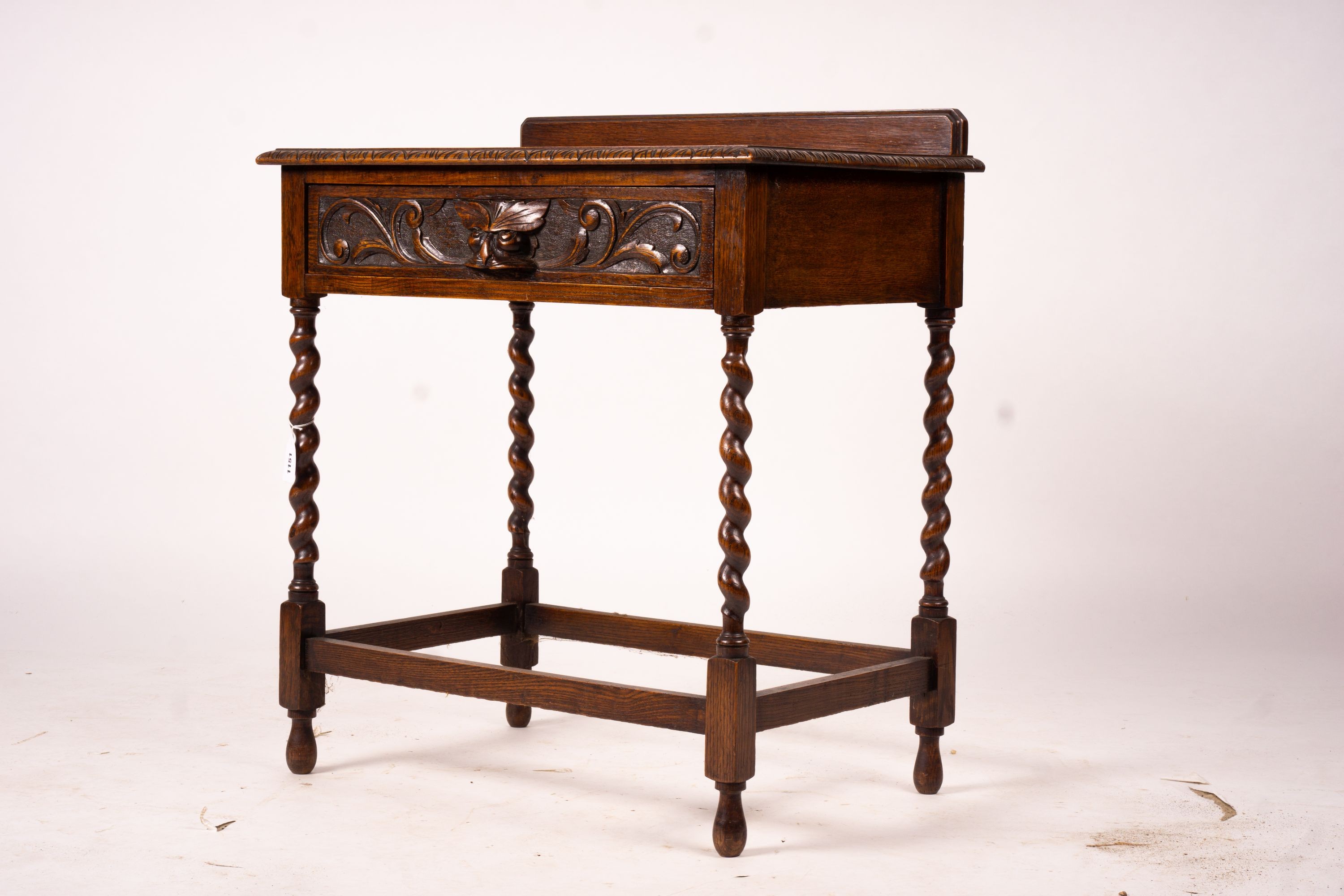 An early 20th century Flemish carved oak side table, W.69cm D.46cm H.77cm